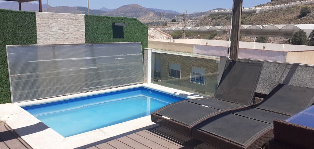 Foto 1 de Venta de casa adosada en calle Camino de Las Ventillas de 3 habitaciones con terraza y piscina
