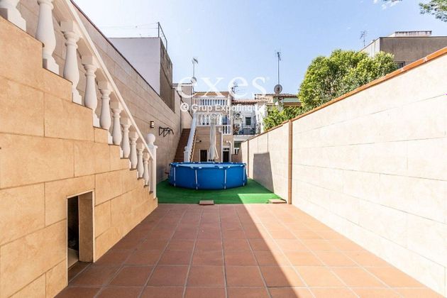 Foto 1 de Casa adossada en venda a Gràcia de 5 habitacions amb terrassa i jardí