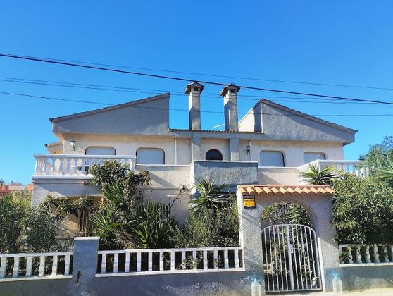 Foto 1 de Xalet en venda a Miami Platja - Miami Playa de 8 habitacions amb terrassa i garatge
