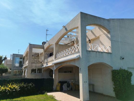 Foto 1 de Casa adosada en venta en Ardiaca - La Llosa de 3 habitaciones con terraza y piscina