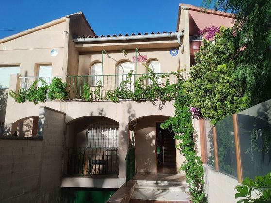 Foto 1 de Casa adossada en venda a calle Pal de 3 habitacions amb terrassa i garatge