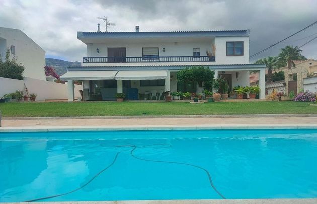 Foto 1 de Venta de chalet en Montsià de Mar de 4 habitaciones con terraza y piscina