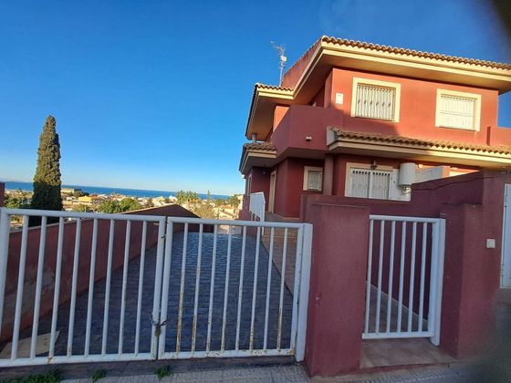 Foto 1 de Venta de casa en Los Urrutias de 3 habitaciones con terraza y garaje
