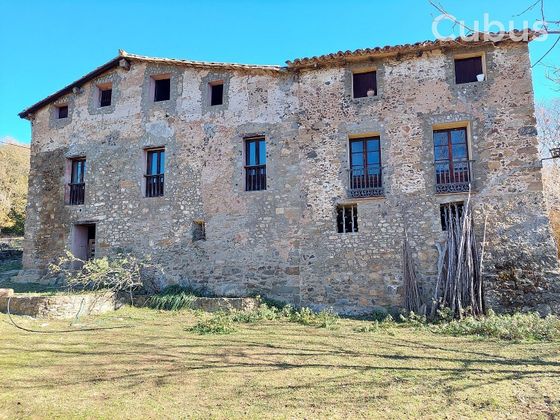Foto 1 de Casa rural en venta en Sant Joan les Fonts de 5 habitaciones con jardín y balcón
