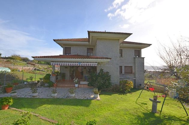Foto 1 de Xalet en venda a Moaña de 4 habitacions amb terrassa i piscina