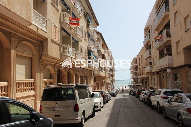 Foto 1 de Venta de piso en Guardamar Playa de 4 habitaciones con terraza y garaje