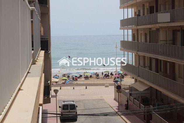 Foto 1 de Venta de piso en Guardamar Playa de 3 habitaciones con terraza y garaje