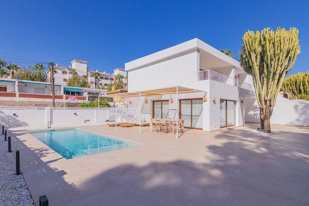 Foto 1 de Venta de casa adosada en L'Albir-Zona Playa de 2 habitaciones con piscina y balcón