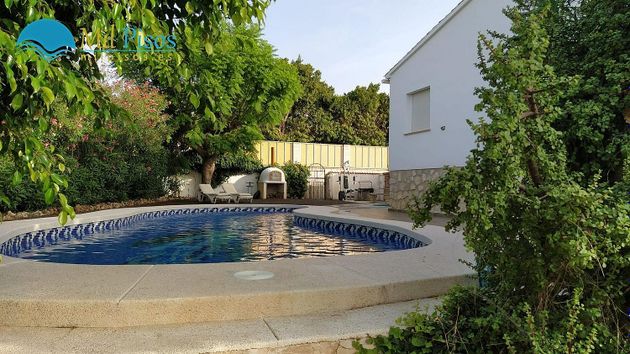 Foto 2 de Venta de chalet en Pueblo Poniente de 4 habitaciones con terraza y piscina