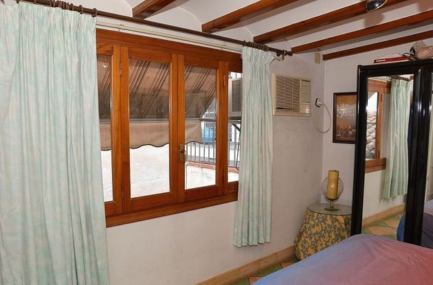 Foto 1 de Casa adosada en venta en calle Sant Francesc de 4 habitaciones con terraza
