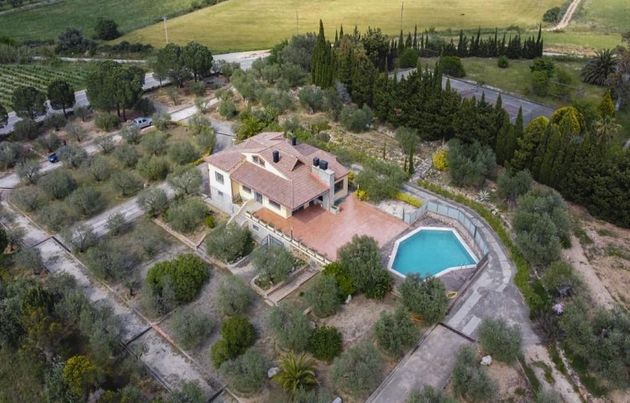 Foto 1 de Venta de chalet en Sant Climent Sescebes de 4 habitaciones con piscina y garaje