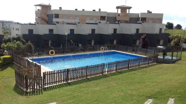 Foto 1 de Venta de casa en calle Lola Anglada de 3 habitaciones con terraza y piscina