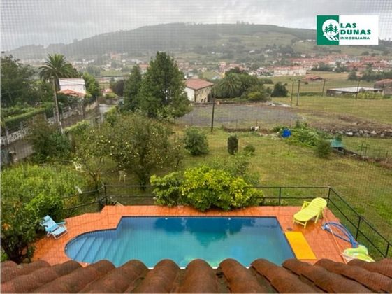 Foto 1 de Venta de chalet en Meruelo de 4 habitaciones con terraza y piscina