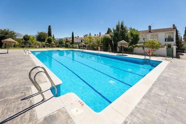 Foto 1 de Casa adosada en venta en Albolote de 6 habitaciones con terraza y piscina