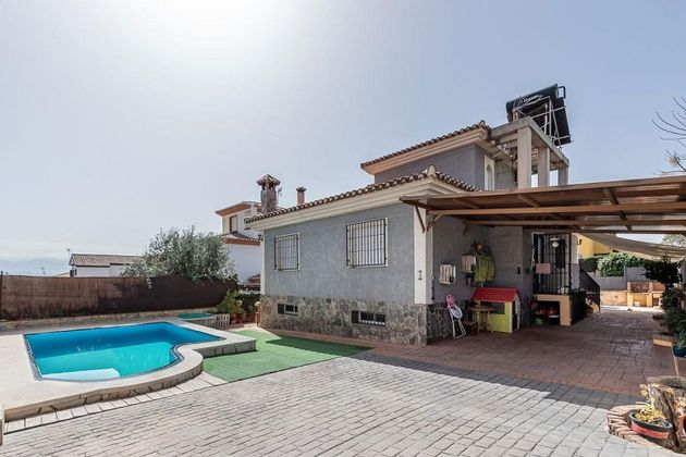 Foto 1 de Chalet en venta en Albolote de 4 habitaciones con terraza y piscina