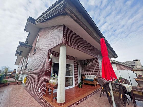 Foto 1 de Casa adosada en venta en Arnuero de 4 habitaciones con terraza y piscina