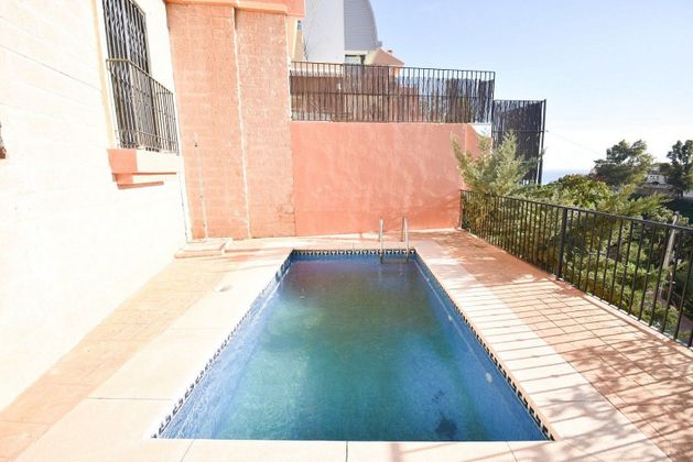 Foto 2 de Casa adosada en venta en Torreblanca del Sol de 4 habitaciones con terraza y piscina