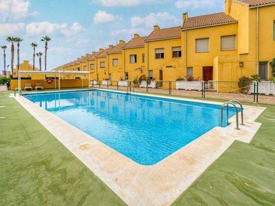 Foto 1 de Venta de casa adosada en Alicante Golf de 3 habitaciones con terraza y piscina