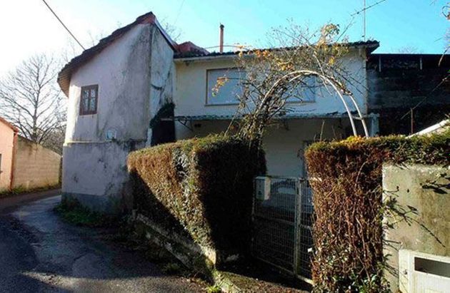 Foto 1 de Casa en venta en calle Almieiras con jardín