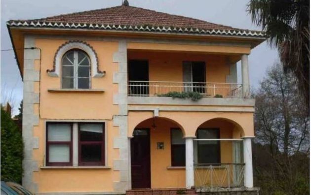 Foto 1 de Casa en venda a calle Gallada Piñeiro de 4 habitacions amb jardí