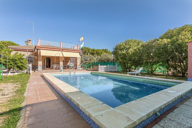 Foto 1 de Venta de chalet en Rinconada (La) de 5 habitaciones con terraza y piscina
