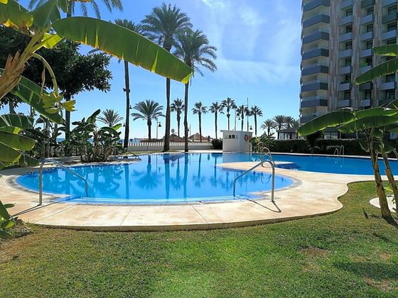 Foto 1 de Venta de piso en Playamar de 4 habitaciones con piscina y jardín