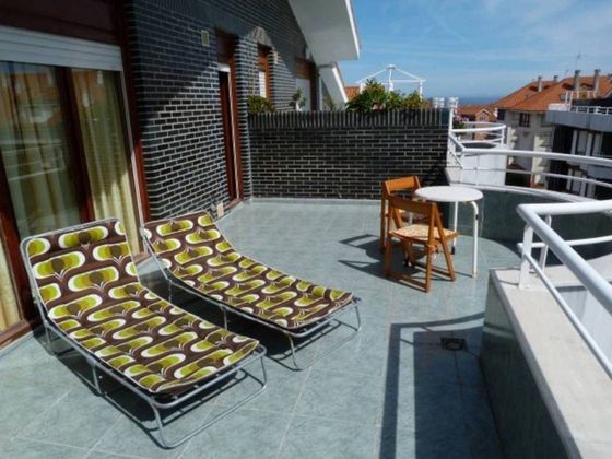 Foto 2 de Piso en venta en Noja de 3 habitaciones con terraza y jardín