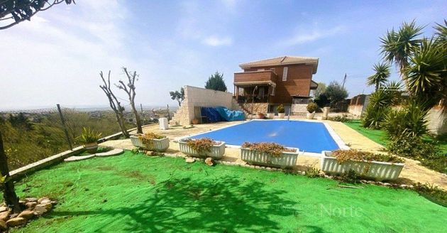 Foto 1 de Chalet en venta en Casar (El) de 5 habitaciones con terraza y piscina