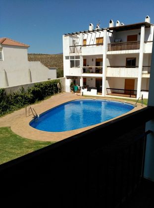 Foto 1 de Piso en venta en Ugíjar de 2 habitaciones con piscina y aire acondicionado