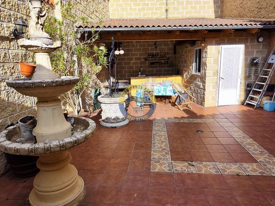 Foto 1 de Casa en venta en Onzonilla de 4 habitaciones con garaje y jardín