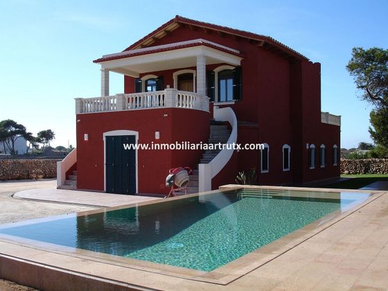 Foto 1 de Casa rural en venda a Cala Blanca de 4 habitacions amb terrassa i piscina