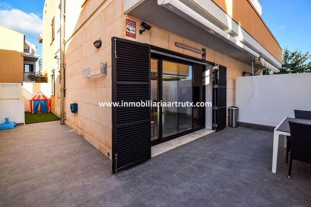 Foto 2 de Casa adosada en venta en Ciutadella de 4 habitaciones con terraza y piscina