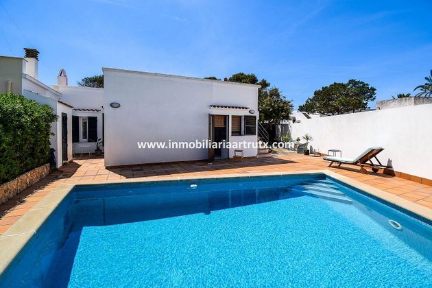 Foto 1 de Casa adossada en venda a Cala En Bosch-Serpentona de 2 habitacions amb terrassa i piscina
