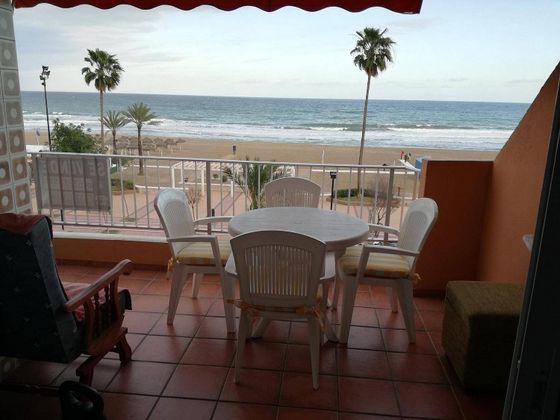 Foto 1 de Venta de piso en Playa de los Boliches de 3 habitaciones con terraza y muebles
