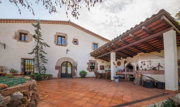 Foto 1 de Casa rural en venda a Figaró-Montmany de 9 habitacions amb terrassa i piscina