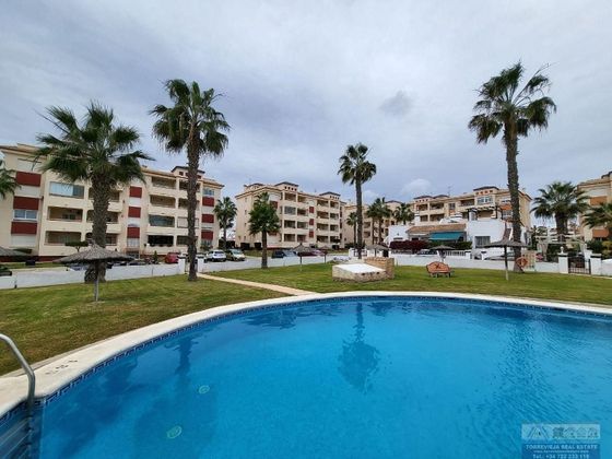 Foto 1 de Pis en venda a Playa Flamenca - Punta Prima de 2 habitacions amb terrassa i piscina