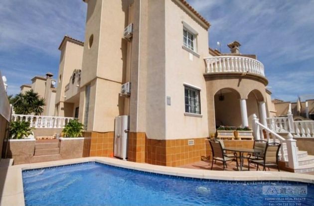 Foto 1 de Casa en venda a Campos de Golf - Villa Martin - Los Dolses de 3 habitacions amb piscina i jardí