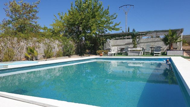 Foto 1 de Casa en venda a Salinas de 9 habitacions amb terrassa i piscina
