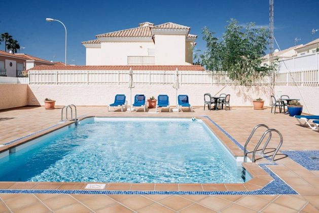 Foto 1 de Casa adossada en venda a Sonnenland de 4 habitacions amb terrassa i piscina