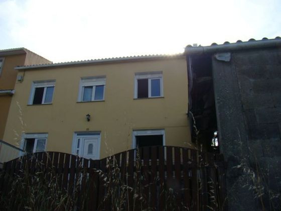 Foto 1 de Casa en venda a calle Arnela de 4 habitacions amb jardí i calefacció
