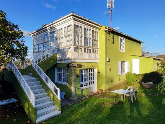 Foto 1 de Casa en venda a Cambre de 5 habitacions amb garatge i jardí