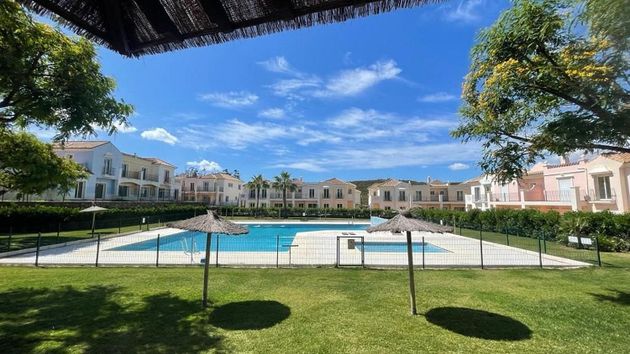 Foto 1 de Casa en venta en Costa Esuri de 4 habitaciones con terraza y piscina
