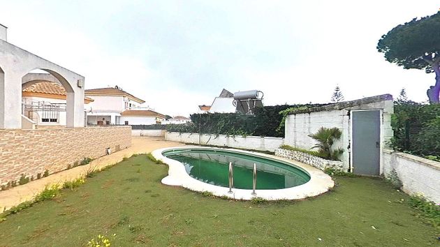 Foto 1 de Casa en venda a Cartaya de 4 habitacions amb terrassa i piscina
