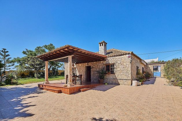 Foto 1 de Casa rural en venda a Puerto Real de 6 habitacions amb piscina i jardí
