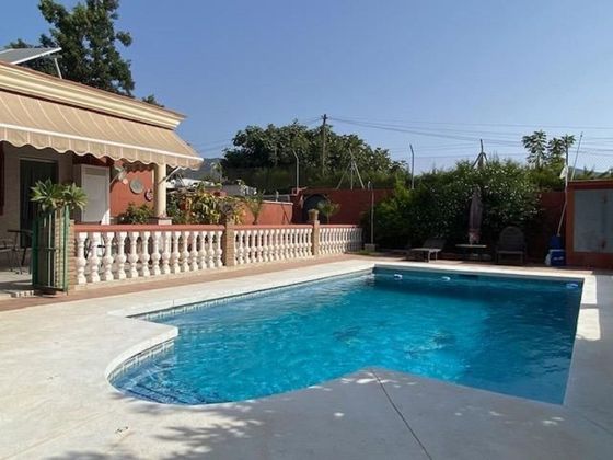 Foto 1 de Venta de casa en Las Lagunas de 4 habitaciones con piscina y aire acondicionado