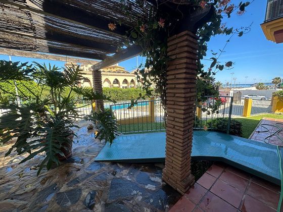 Foto 1 de Casa adossada en venda a Zona Sohail de 3 habitacions amb piscina i jardí