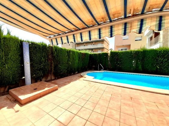 Foto 2 de Venta de casa adosada en Miramar de 3 habitaciones con terraza y piscina