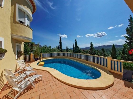 Foto 1 de Venta de chalet en Pedreguer de 6 habitaciones con terraza y piscina