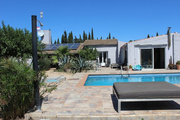 Foto 2 de Venta de casa rural en Pedret i Marzà de 4 habitaciones con terraza y piscina