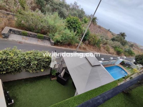 Foto 1 de Venta de casa adosada en calle El Ingenio de 4 habitaciones con terraza y piscina